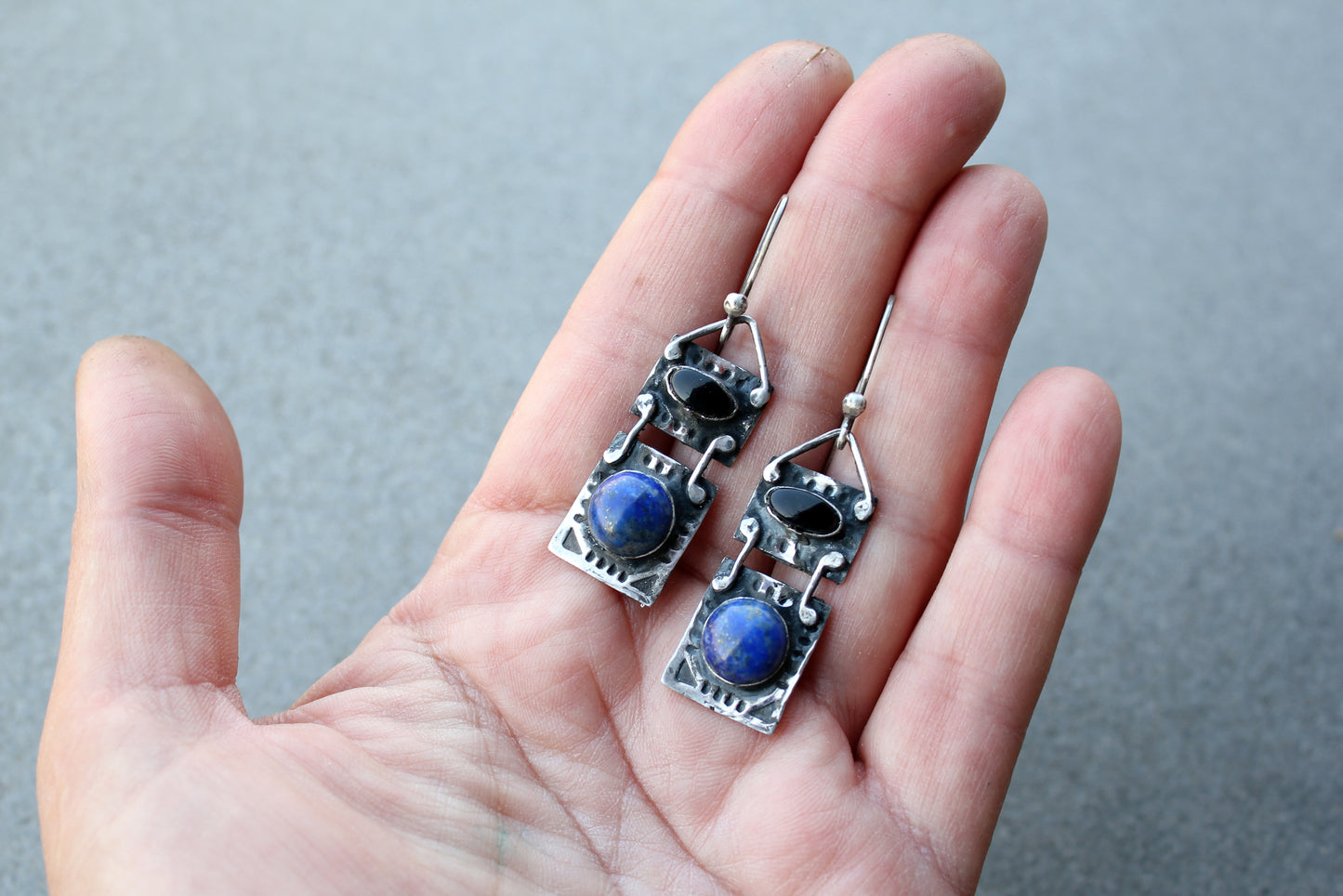 Handmade Armenian artisan silversmith sterling silver rectangular drop drop earrings with round lapis lazuli and oval black onyx cabochons, featuring ethnic-inspired textured metalwork