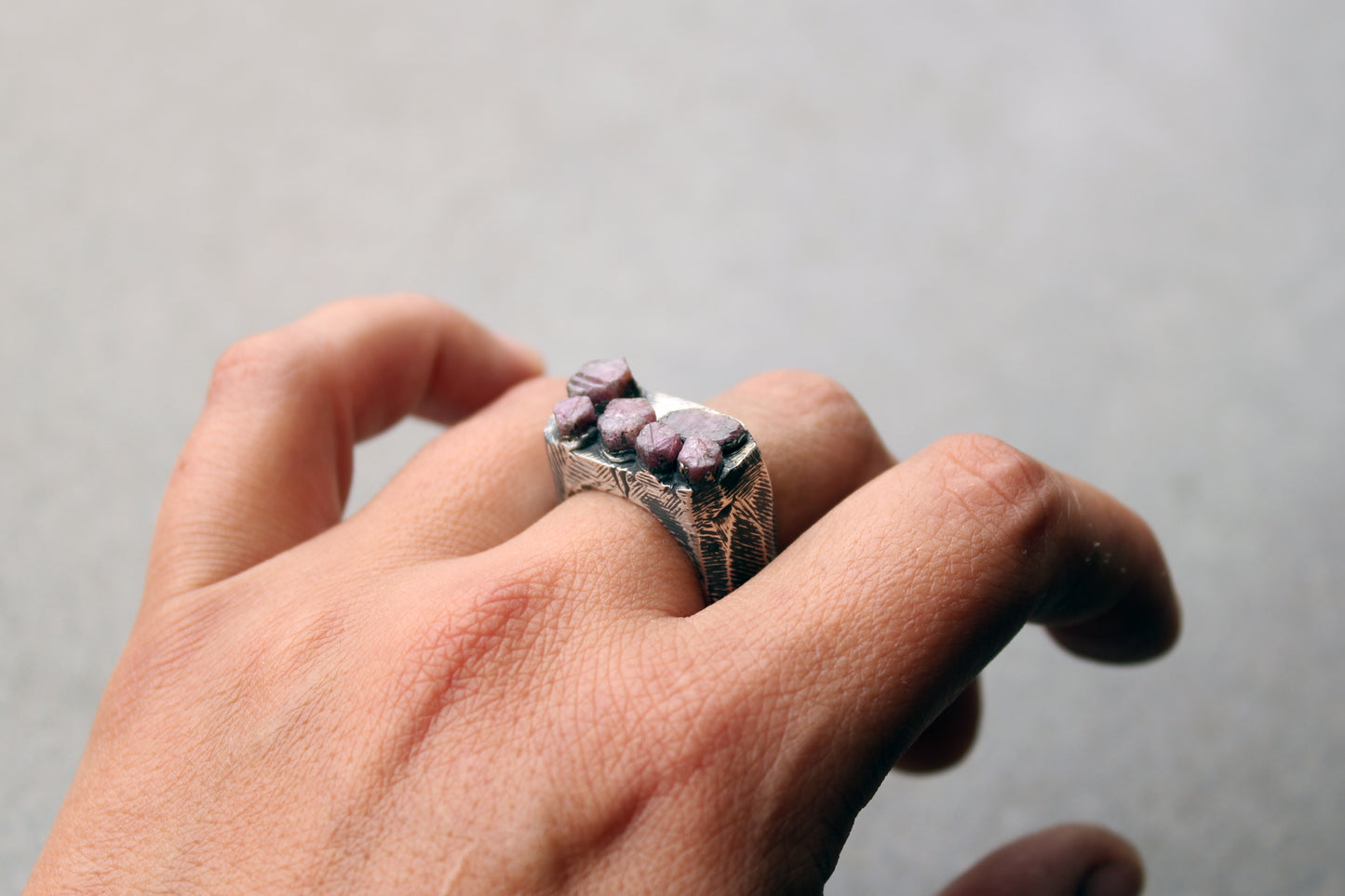 Sterling silver brutalist oxidized Armenian ring with rough ruby gemstone, silversmith, harsh architectural band