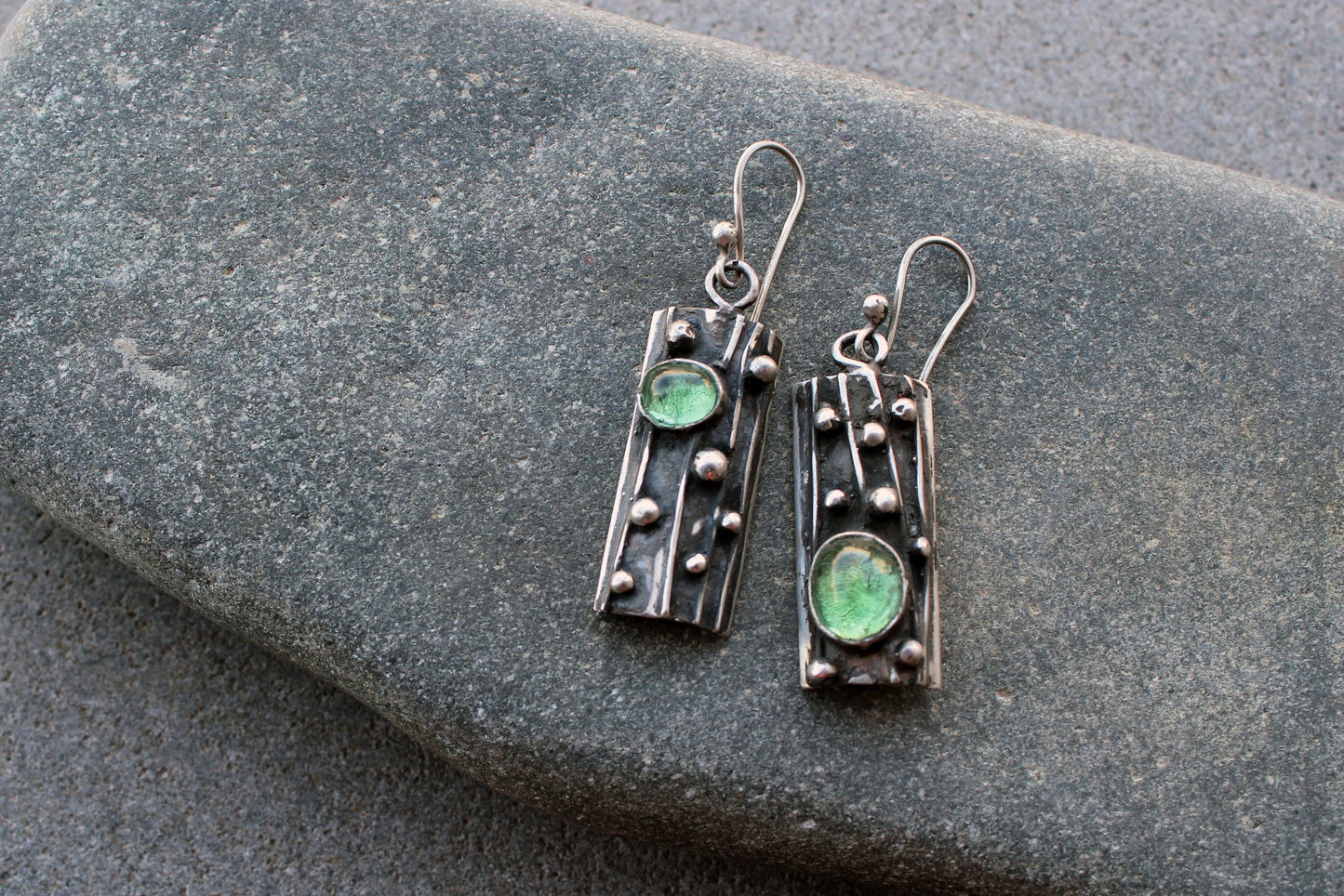 Sterling silver asymmetrical textured black earrings with light green corundum, rustic, silversmith, boho, artisan, tree bark, gift for mom