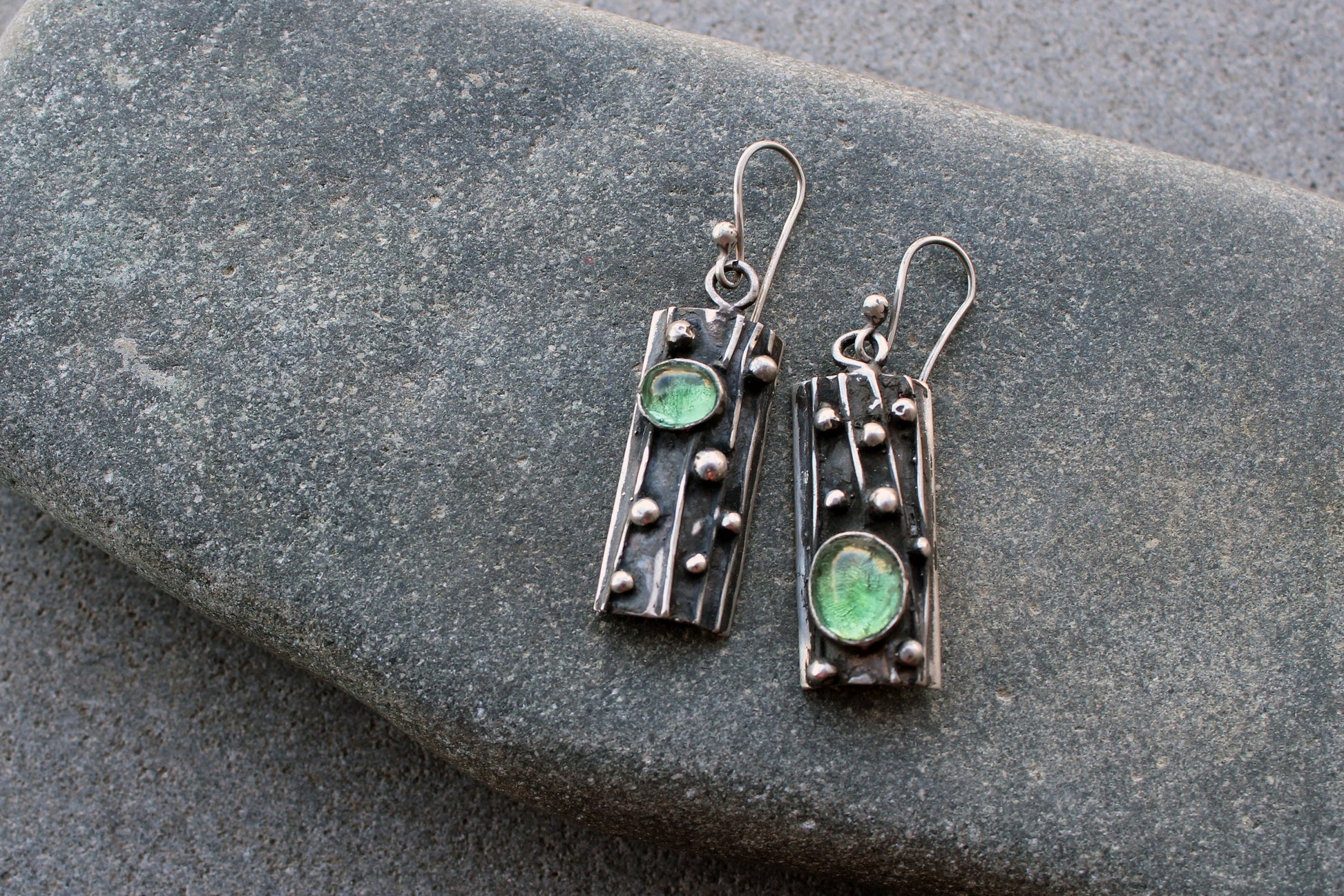 Sterling silver asymmetrical textured black earrings with light green corundum, rustic, silversmith, boho, artisan, tree bark, gift for mom