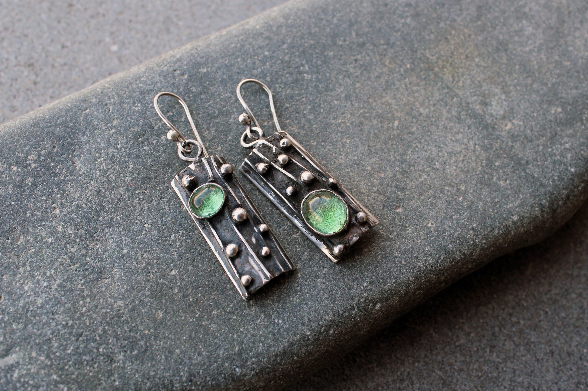 Sterling silver asymmetrical textured black earrings with light green corundum, rustic, silversmith, boho, artisan, tree bark, gift for mom