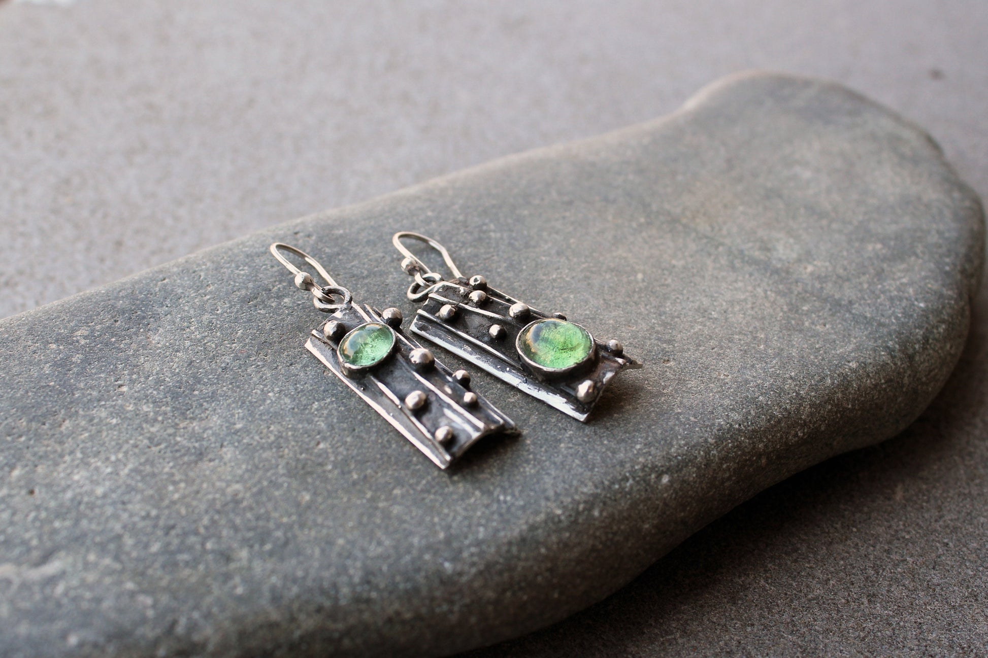 Sterling silver asymmetrical textured black earrings with light green corundum, rustic, silversmith, boho, artisan, tree bark, gift for mom