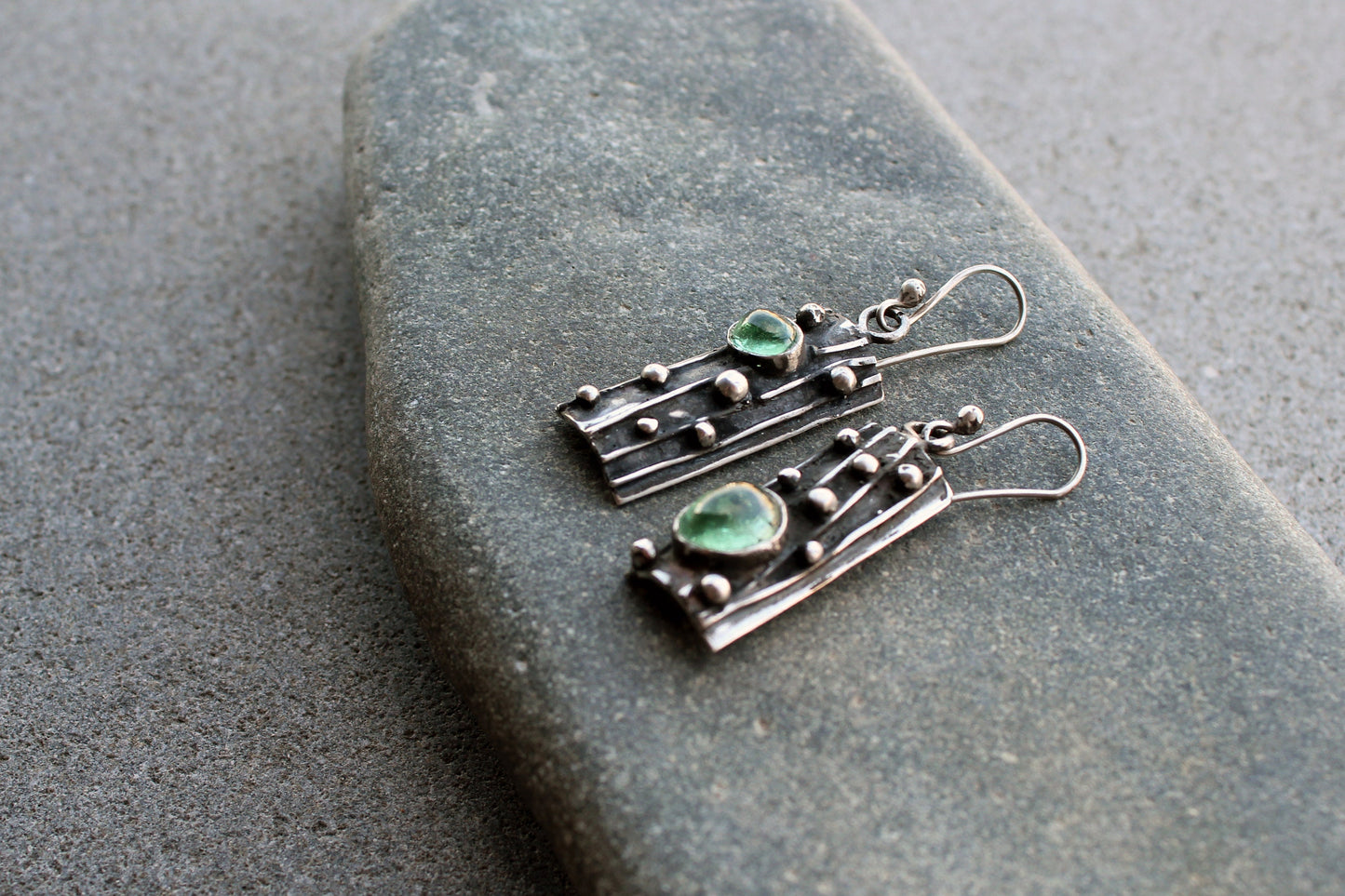 Sterling silver asymmetrical textured black earrings with light green corundum, rustic, silversmith, boho, artisan, tree bark, gift for mom