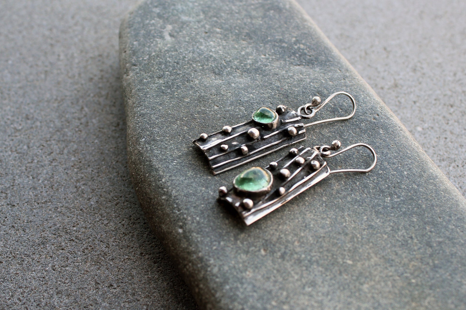 Sterling silver asymmetrical textured black earrings with light green corundum, rustic, silversmith, boho, artisan, tree bark, gift for mom