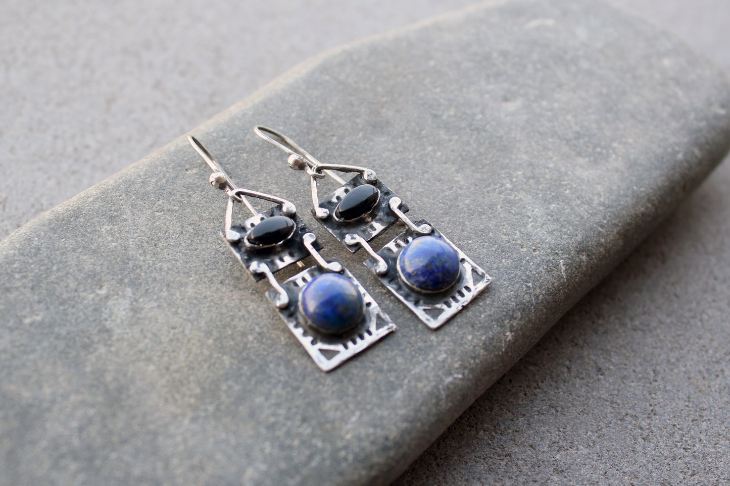 Handmade Armenian artisan silversmith sterling silver rectangular drop drop earrings with round lapis lazuli and oval black onyx cabochons, featuring ethnic-inspired textured metalwork 