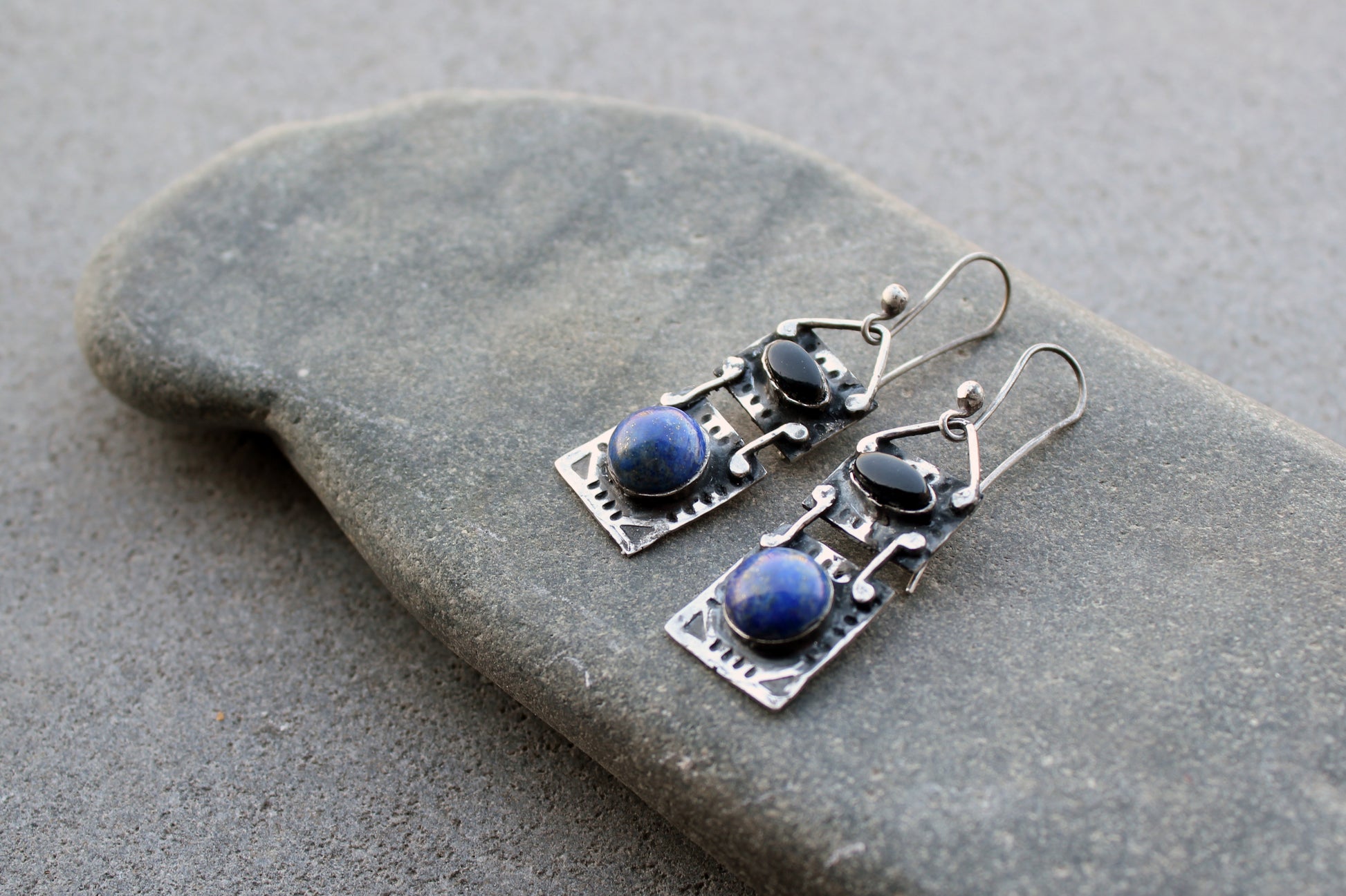 Handmade Armenian artisan silversmith sterling silver rectangular drop drop earrings with round lapis lazuli and oval black onyx cabochons, featuring ethnic-inspired textured metalwork 