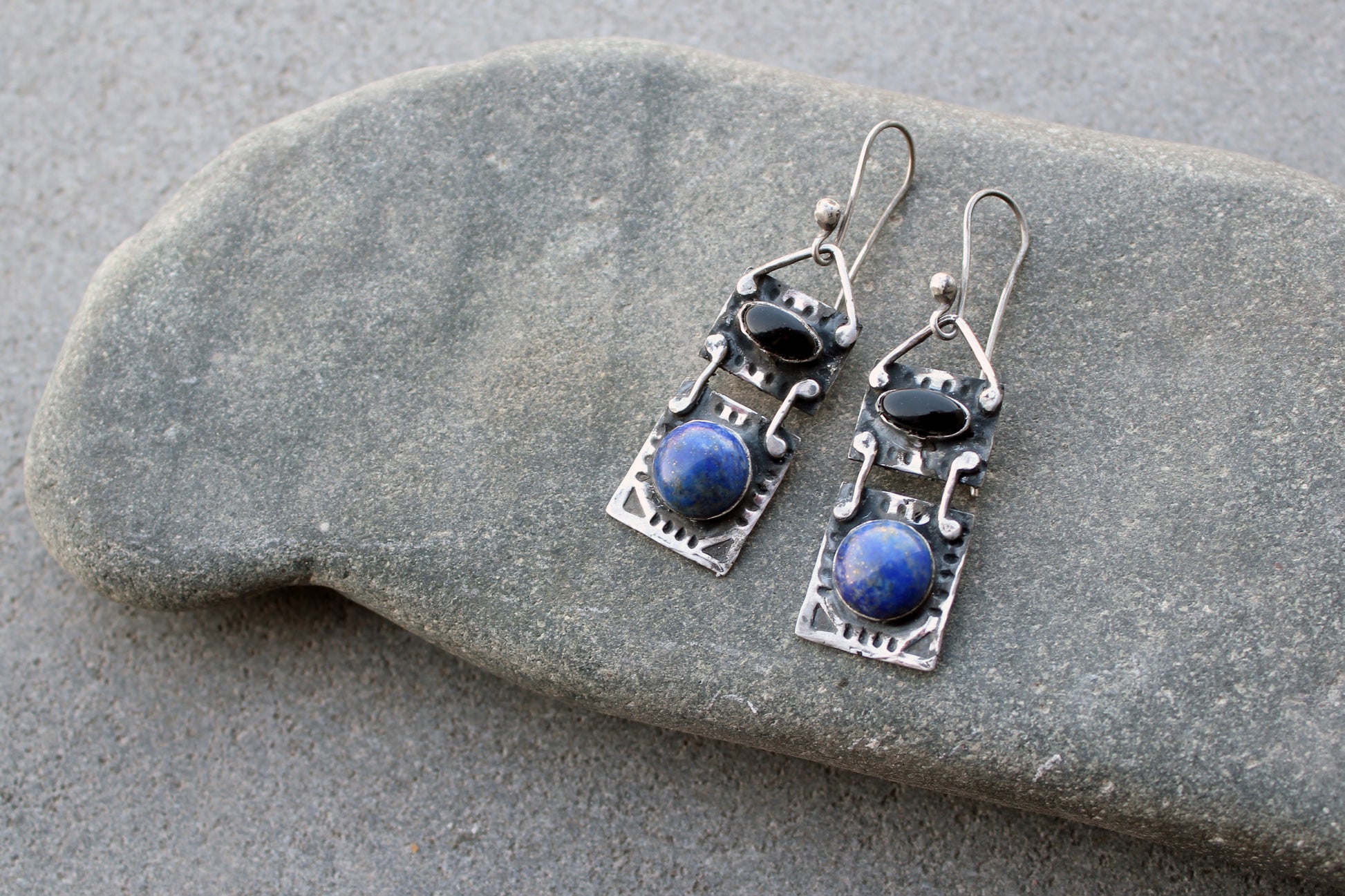 Handmade Armenian artisan sterling silver rectangular drop drop earrings with round lapis lazuli and oval black onyx cabochons, featuring ethnic-inspired textured metalwork 
