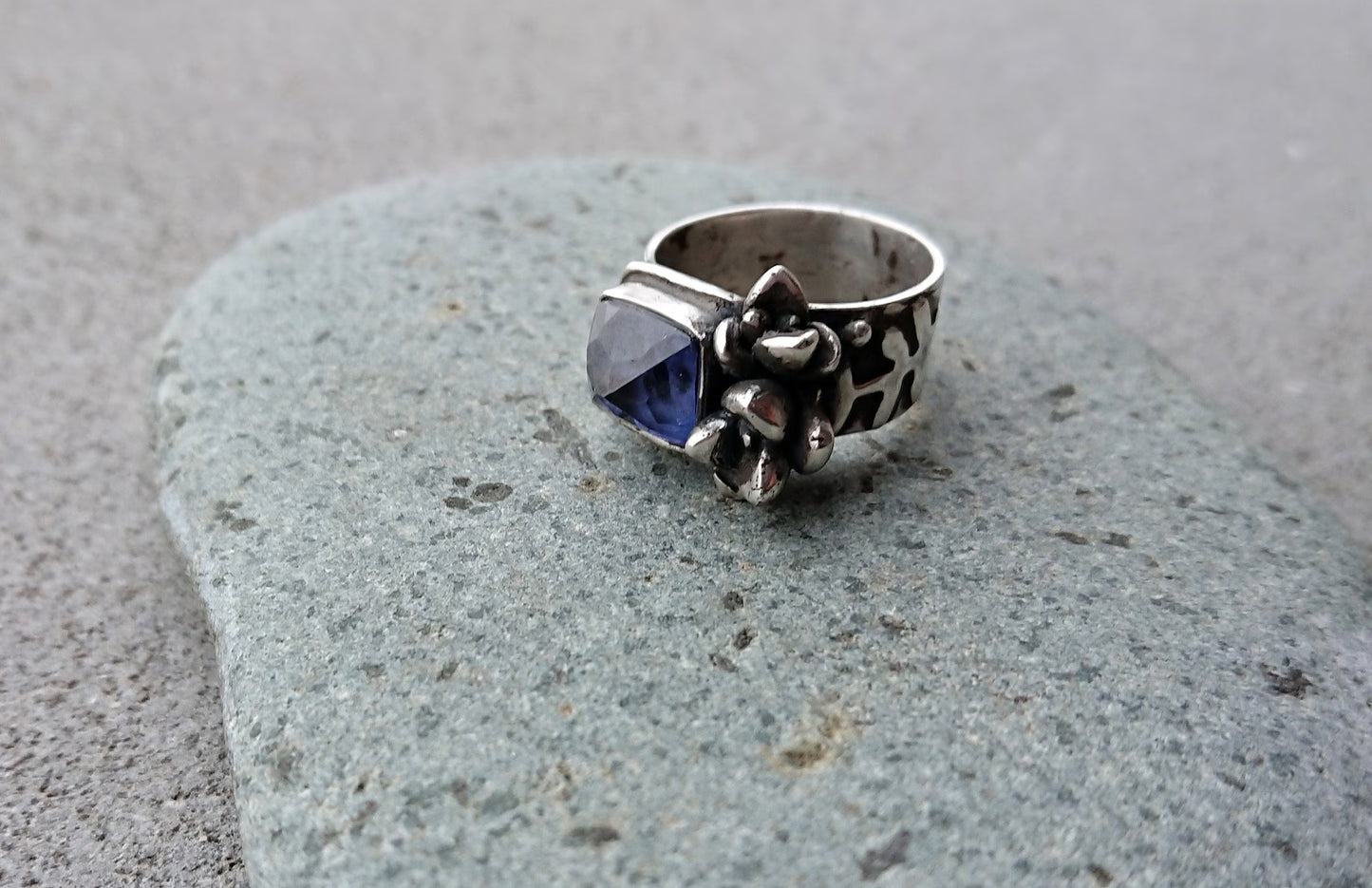 Artisan Armenian handmade sterling silver ring with rectangular lab-grown blue corundum gemstone, accented with organic twig textures and hand cast succulent details