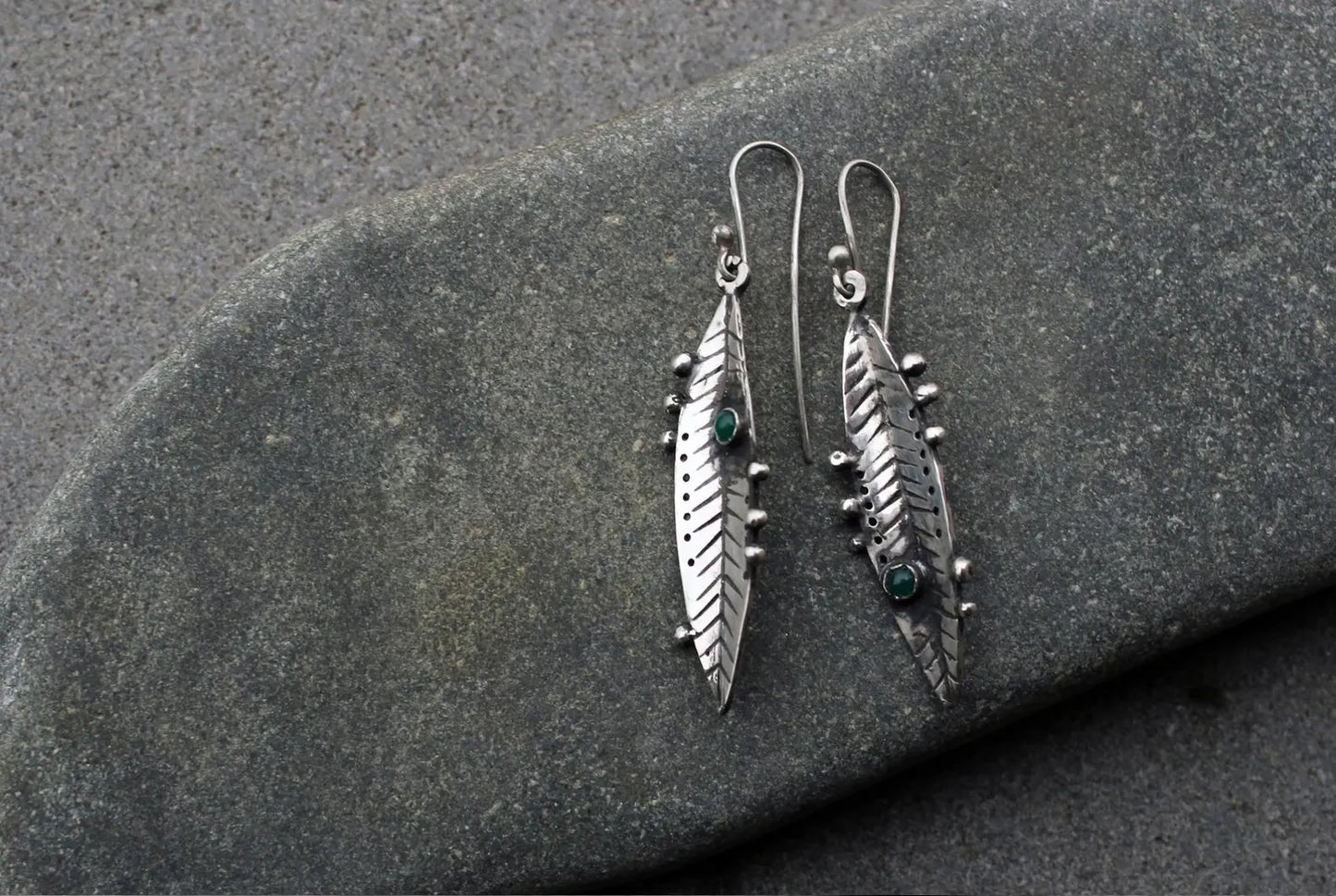 Handmade Armenian sterling silver leaf earrings featuring small round green onyx gemstones, oxidized finish with granule detailing