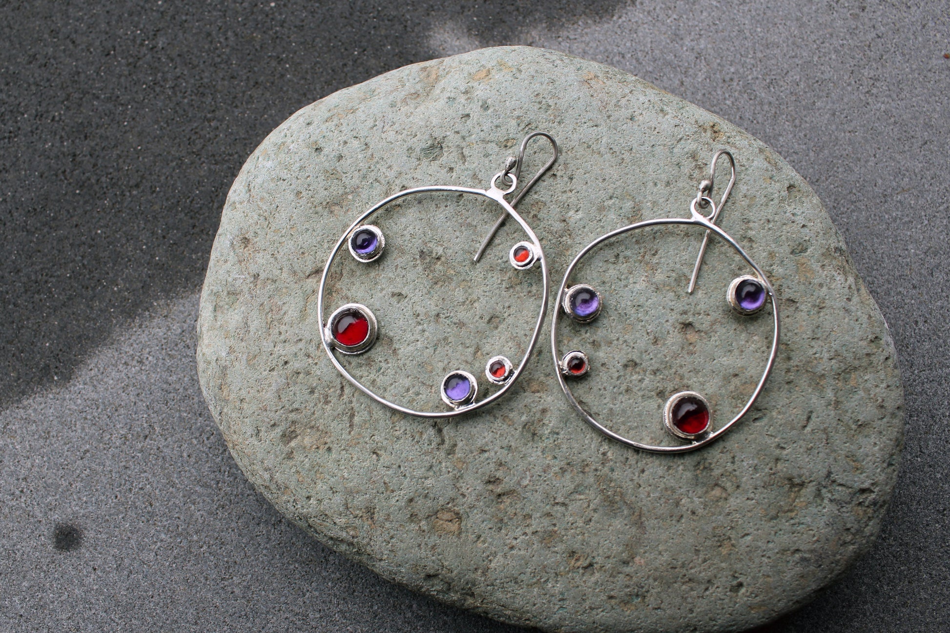 Armenian artisan handmade silver earrings with colorful stones in a minimalist big circle design