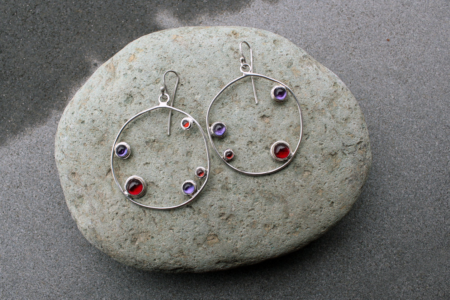 Armenian artisan handmade silver earrings with colorful stones in a minimalist big circle design