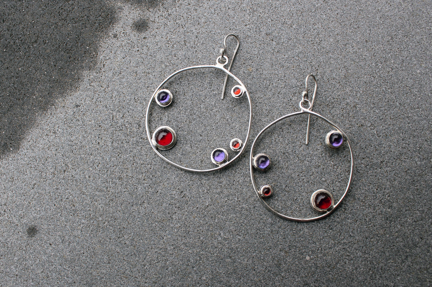 Armenian artisan handmade silver earrings with colorful stones in a minimalist big circle design