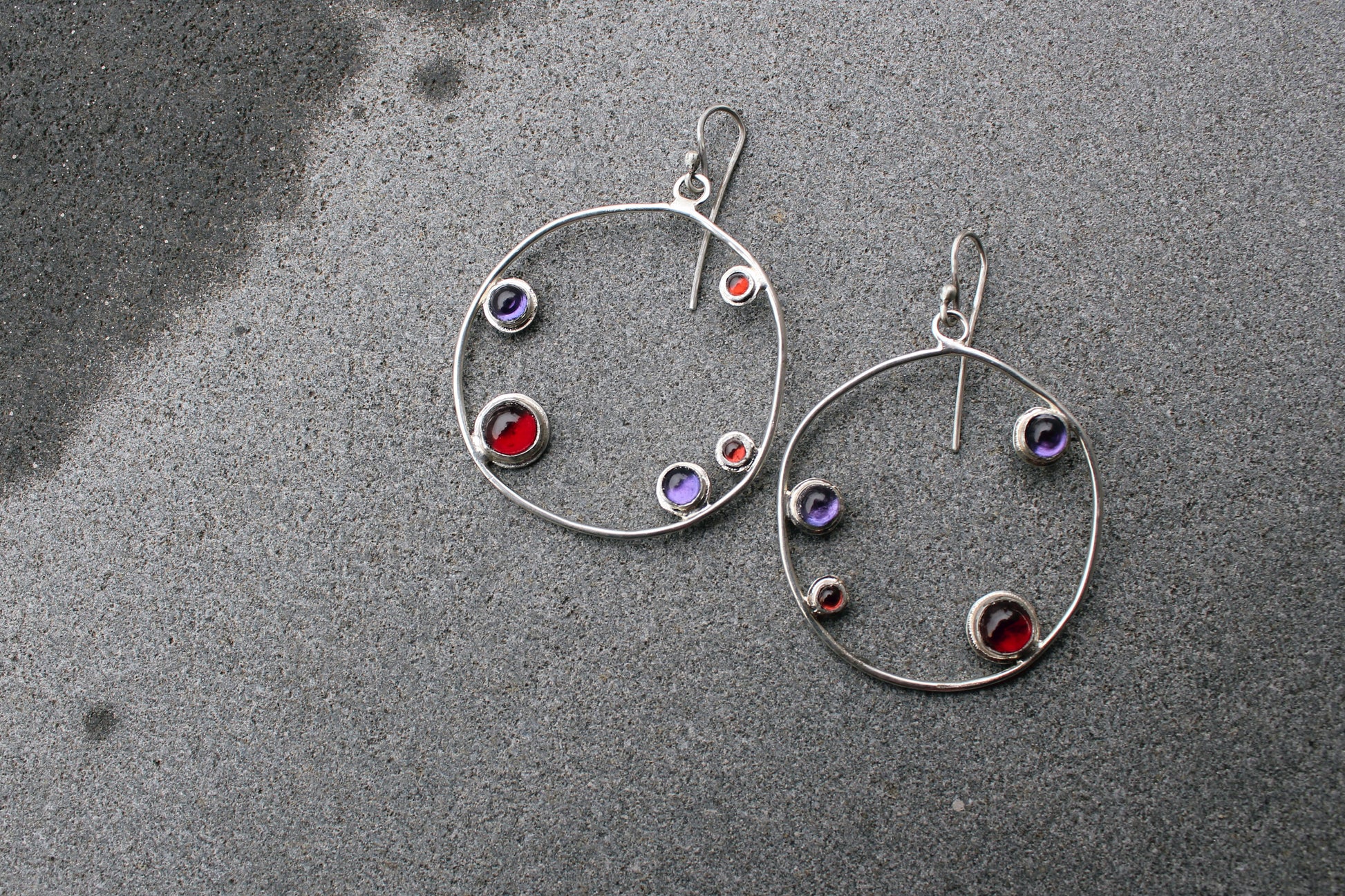 Armenian artisan handmade silver earrings with colorful stones in a minimalist big circle design