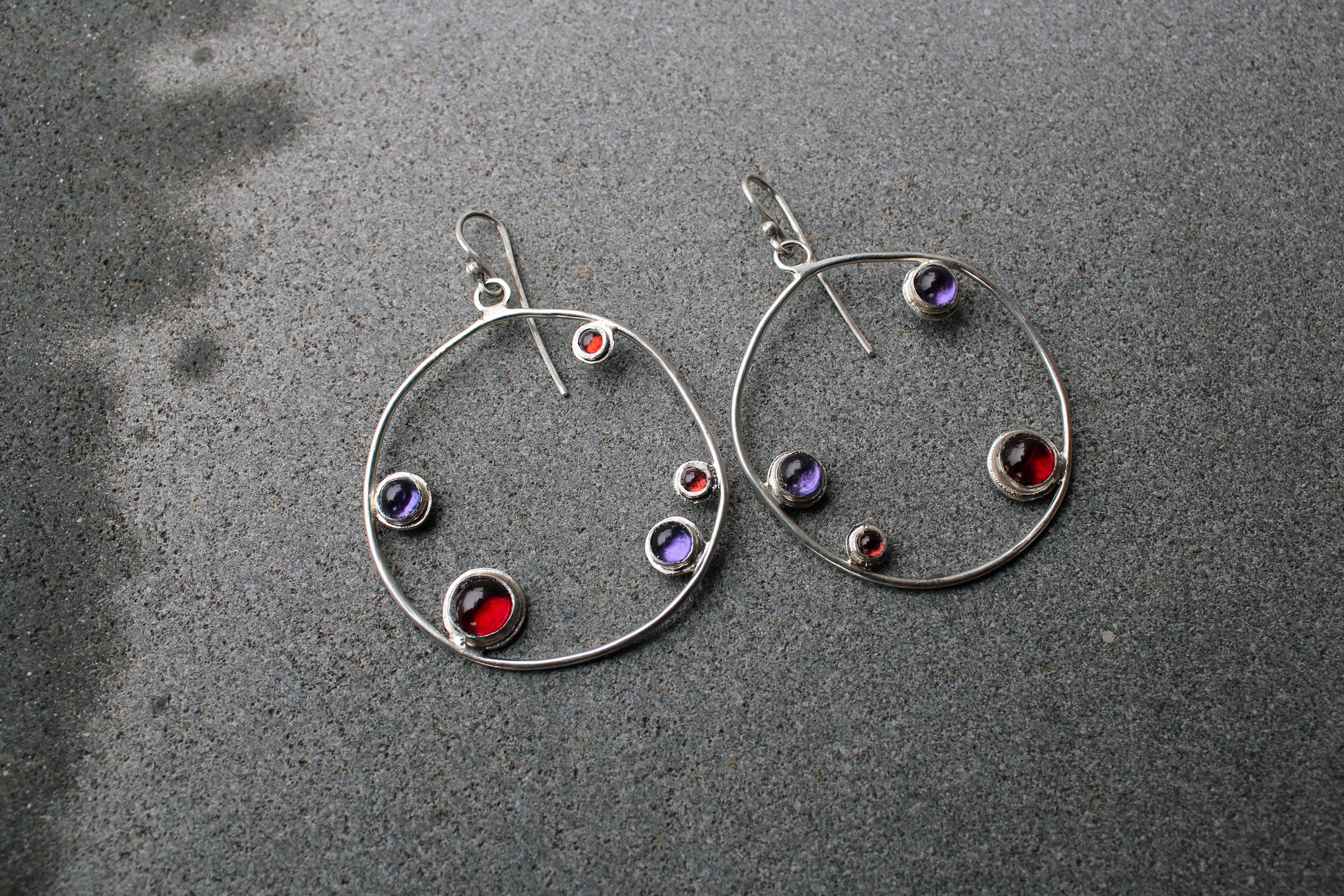Armenian artisan handmade silver earrings with colorful stones in a minimalist big circle design
