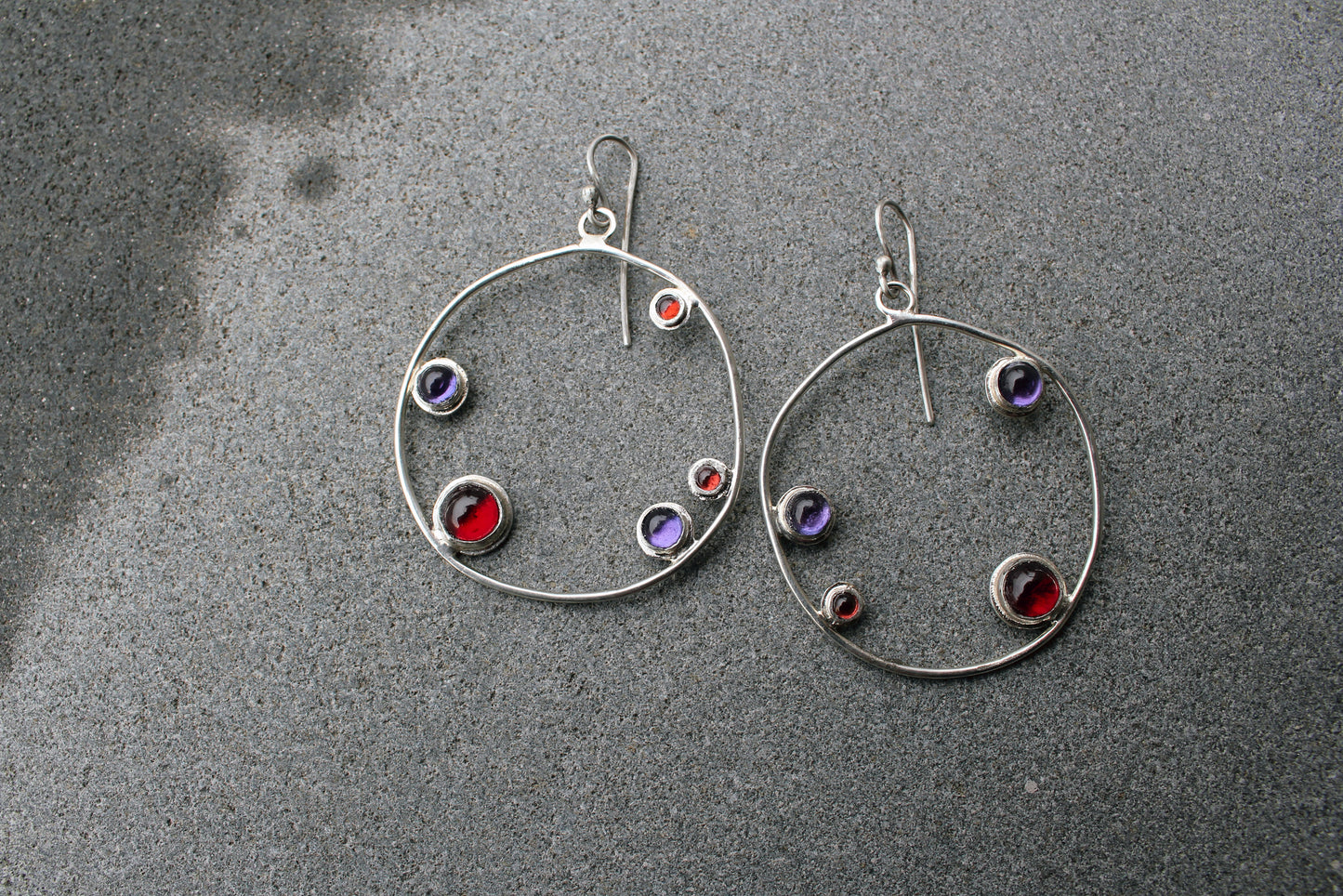 Armenian artisan handmade silver earrings with colorful stones in a minimalist big circle design