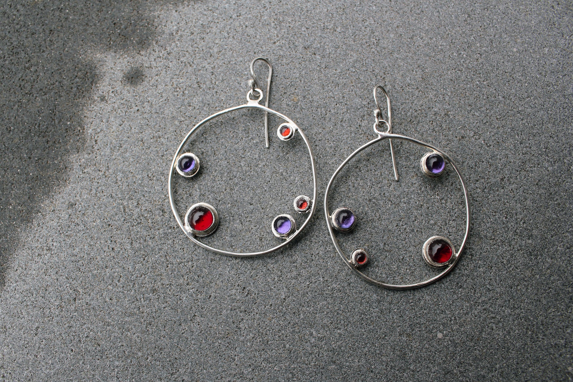Armenian artisan handmade silver earrings with colorful stones in a minimalist big circle design