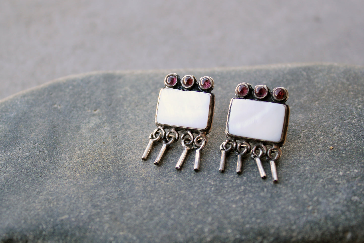 Armenian artisan handmade sterling silver stud earrings with square mother of pearl center, garnet stones and dangling fringe details