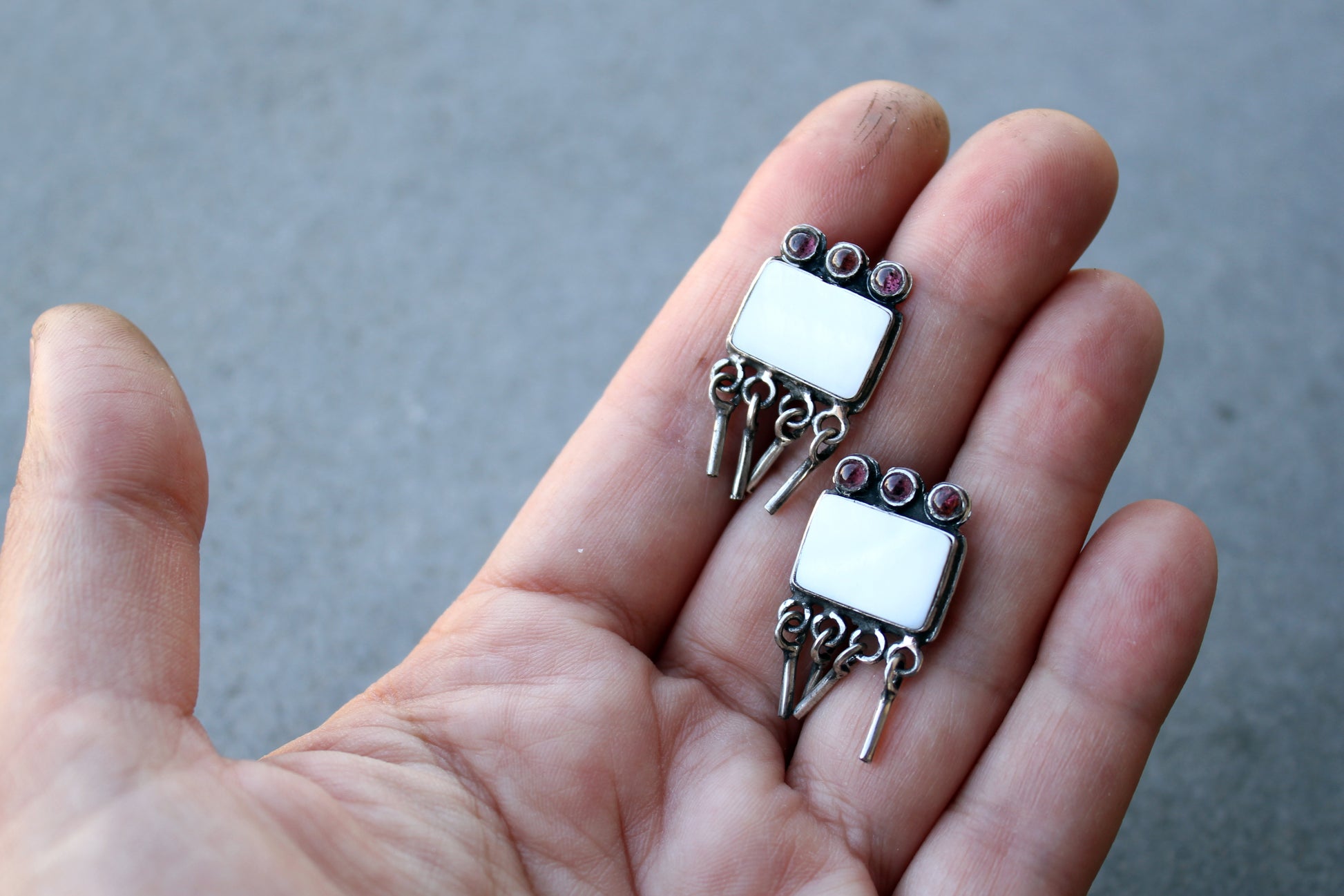 Armenian artisan handmade sterling silver stud earrings with square mother of pearl center, garnet stones and dangling fringe details