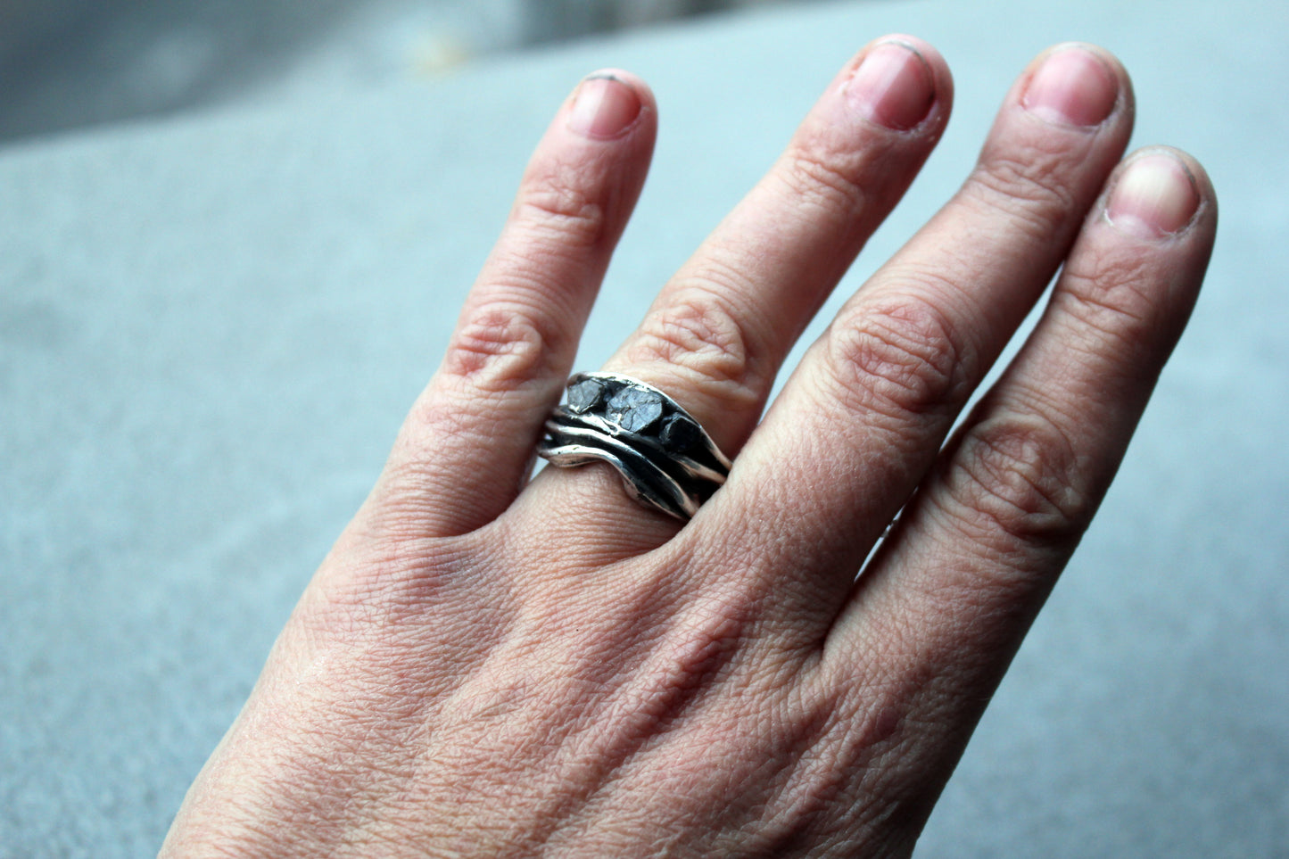 Sterling silver brutalist oxidized Armenian ring with rough sapphire gemstones, silversmith, harsh architectural band