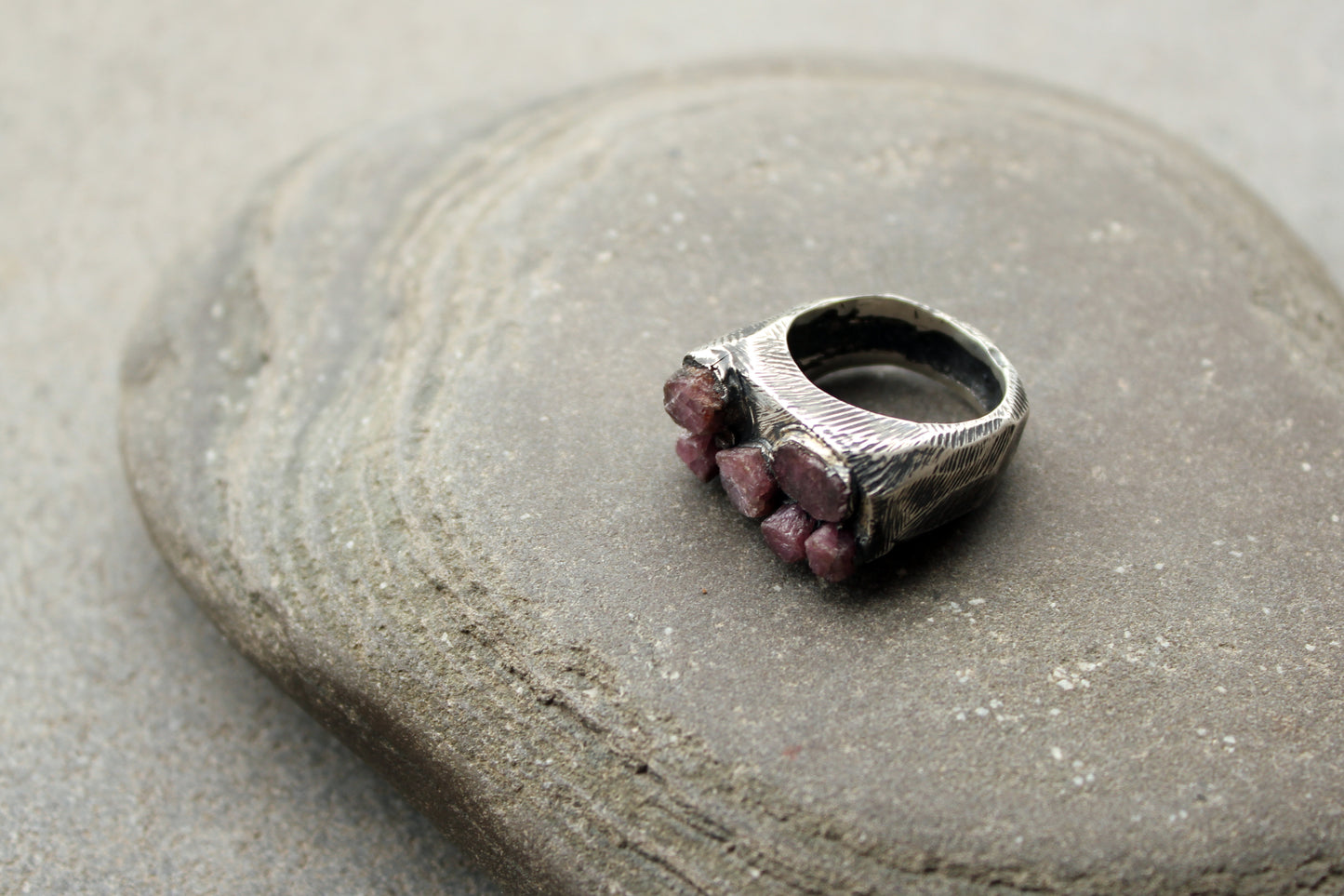 Sterling silver brutalist oxidized Armenian ring with rough ruby gemstone, silversmith, harsh architectural band