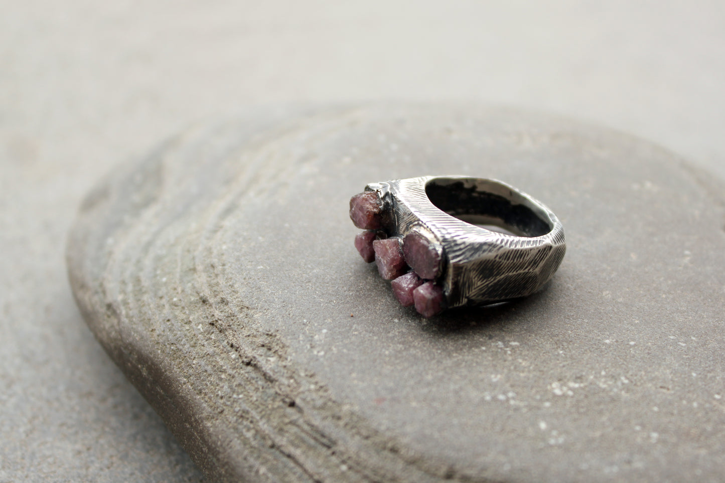 Sterling silver brutalist oxidized Armenian ring with rough ruby gemstone, silversmith, harsh architectural band
