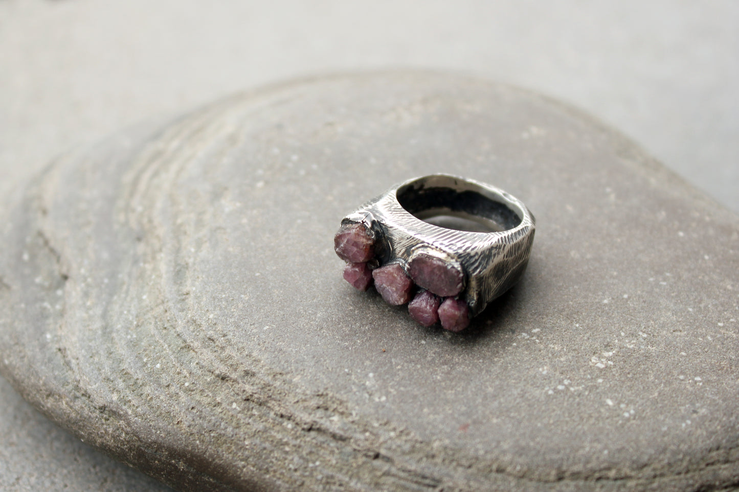 Sterling silver brutalist oxidized Armenian ring with rough ruby gemstone, silversmith, harsh architectural band